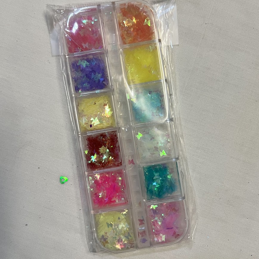 confeti con diseños neón y metalizados mariposa